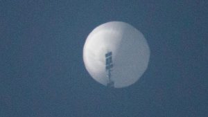 Chinese surveillance balloon imaged in the sky (BBC)
