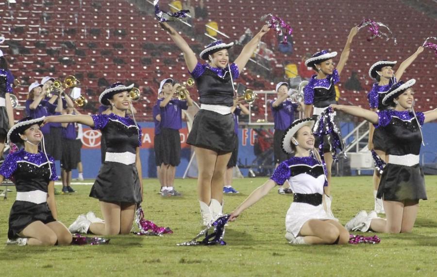 Shayna Ambers (center) is a standout member of the Royals Drill Team 