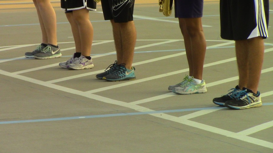 Marching band spent eight to nine hours during the summer to condition and rehearse for the season.