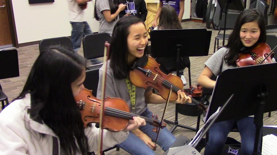 Jennifer Ke, Melissa Wang, and Angelina Kim are practicing their trio for competition.