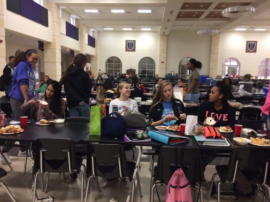 These varsity basketball players bond and connect over a breakfast social.