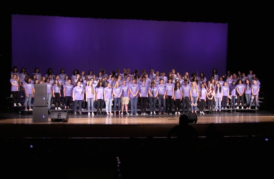 All of the choir members come together for the last time to sing “Send It On” to close out their final concert of the year.