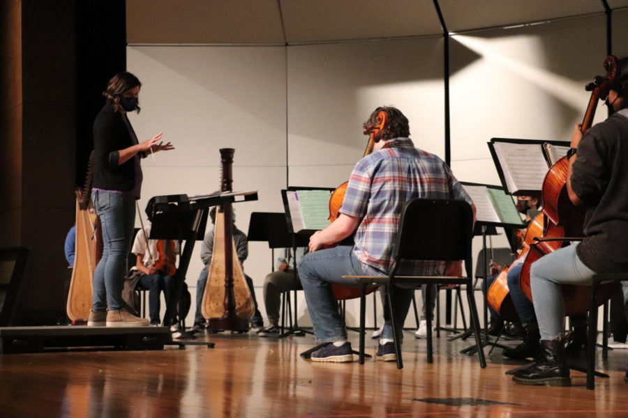 Orchestra Director Lindsey Titus instructs her students though a piece of music.