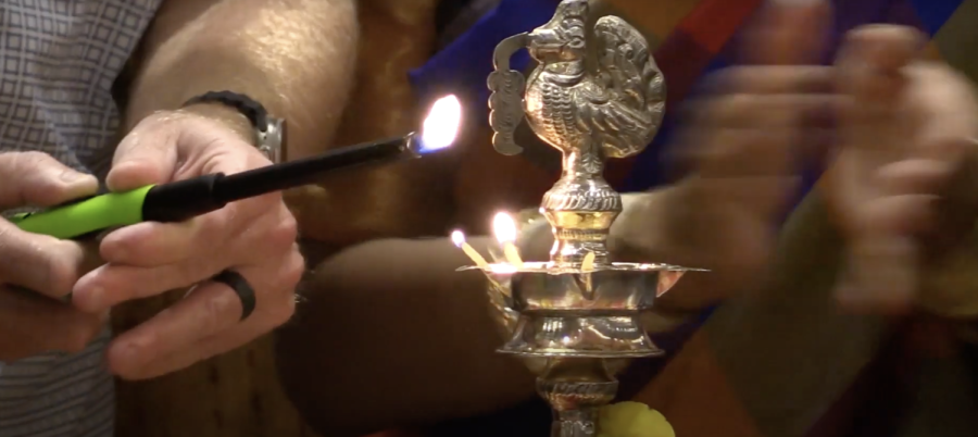 Frisco Mayor Jeff Cheney lights a Diya at Frisco's first annual Diwali Lamp Lighting Ceremony on October 23, 2022